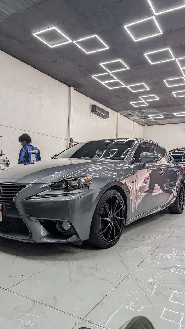 A silver Lexus with a corrected, reflective finish